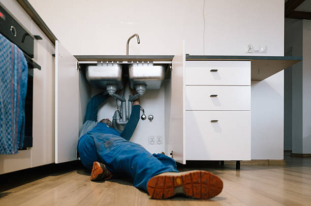 Professional Drain Cleaning technician working in Midland, VA